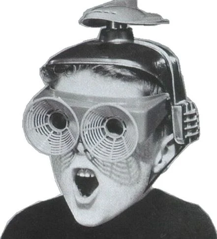 A person wearing a vintage experimental viewing headset.